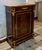 Enhance your interior with this magnificent Louis XVI-inspired commode cabinet, a sophisticated statement piece that...