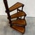 Spiral Library Staircase – Regency Style – Mahogany & Gilt Leather An elegant four-step spiral library staircase in the...