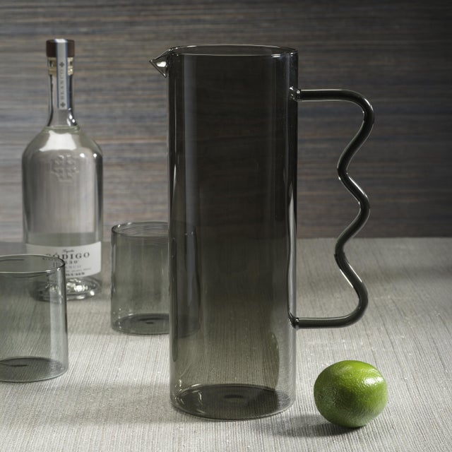 Elevate your drinkware collection with the Costa de Sol Glass Pitcher. Featuring a transparent colored design, this...
