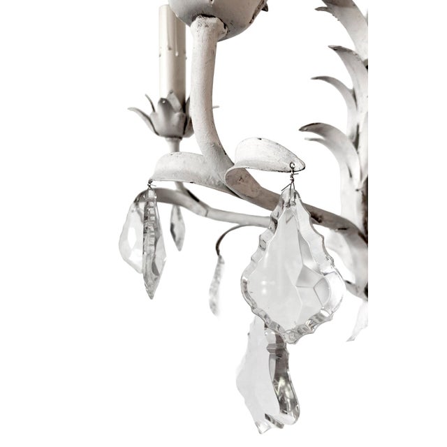 Stunning pair of mid-century Italian tole wall sconces in the Hollywood regency style. The pair each with three lights &...