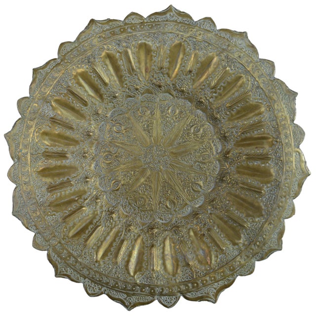 Midcentury highly crafted, engraved and detailed Moroccan brass tray with ornate multi-dimensional hand-engraved layers...