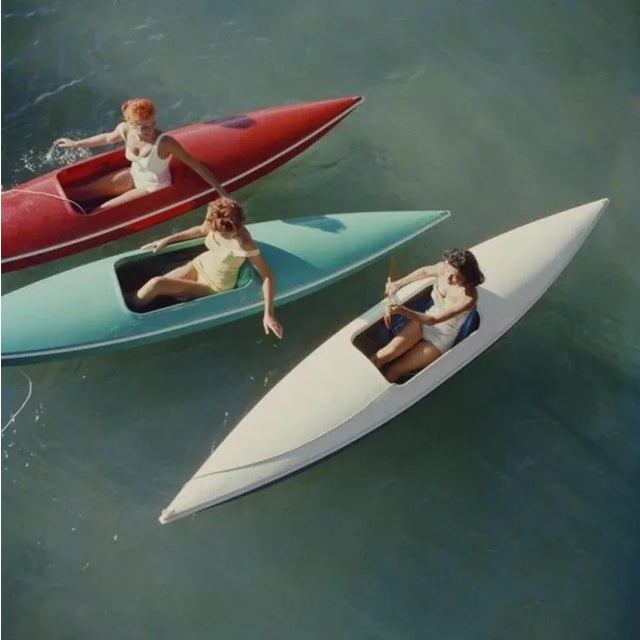 Lake Tahoe Trip 1959 by Slim Aarons Slim Aarons Limited Estate Edition Young women canoeing on the Nevada side of Lake...