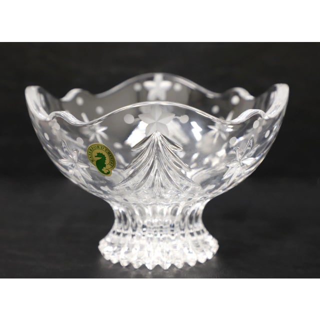 An Early 21st Century candy dish by Waterford, their "Christmas Night" pattern. Clear crystal with a cut diamond-like...