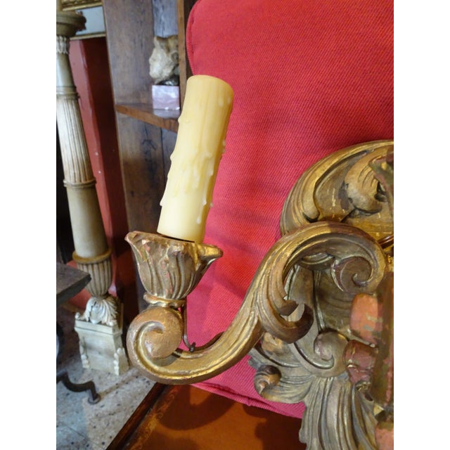 Beautiful pair of 19th Century Italian giltwood sconces. Acanthus leaf design. The whole sconce is carved wood. 2 arms. US...