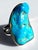 This striking vintage statement ring showcases a magnificent freeform slice of genuine Arizona blue turquoise, celebrated...