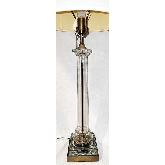 A mid-century classic, a tall glass column table lamp on dark brass base and are correct cylindrical shade, pull chain...