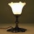 This table lamp seduced by its old charm and its delicate design. with her brass foot and her molded glass lampshade, she...