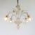 This spectacular gold-infused Cristallo Murano chandelier features four scroll arms with tri-lobed cups, elegantly styled...