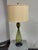 Design Plus Gallery presents a Vintage Art Glass Table Lamp. It has an elongated teardrop form body detailed in olive...