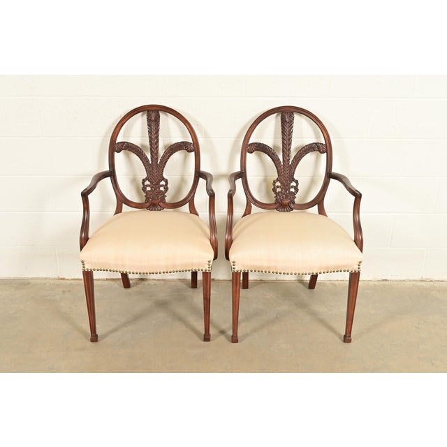 A gorgeous pair of antique French Regency Louis XVI style armchairs or dining chairs By Romweber USA, Circa 1930s Solid...