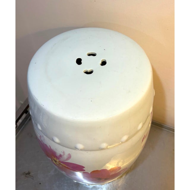 1960s-70s white/pink floral Chinese ceramic garden stool/plant stand. Some fading to pink floral pattern in a few places,...