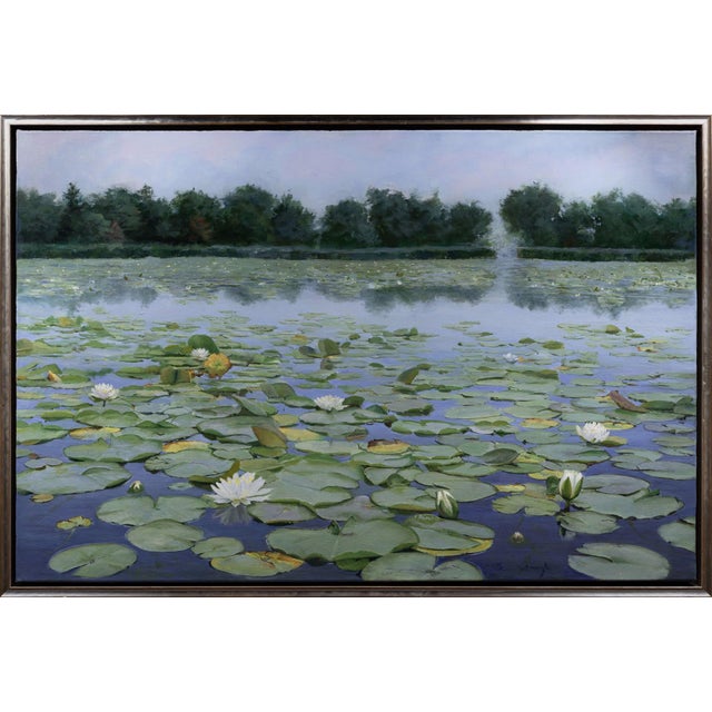 The artwork depicts a serene lily pond, where delicate white blossoms float gracefully atop broad green leaves, reflecting...