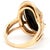 This bold and captivating 14K yellow gold ring features a smooth oval onyx stone set in a beautifully textured band. It's...