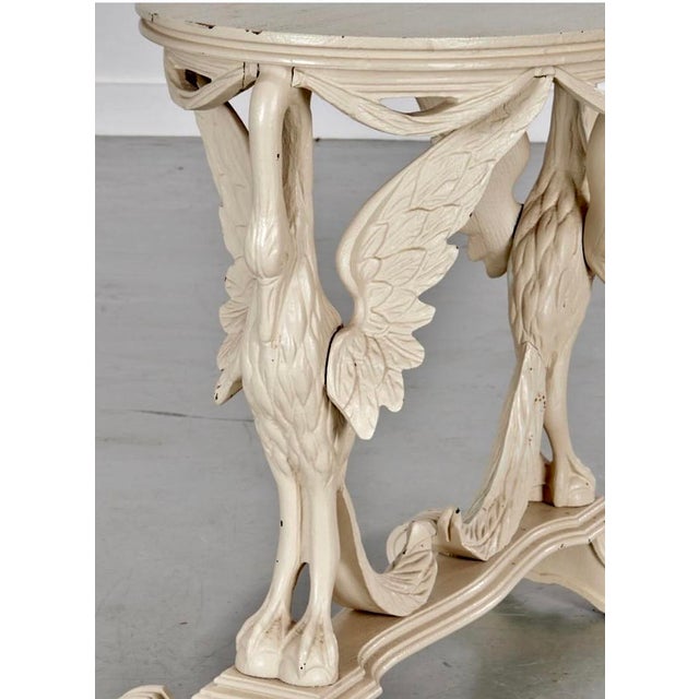 Just in, This charming Art Deco French Painted Swan Oval Side Table is made of Pine wood, c.1930s. There are few paint...