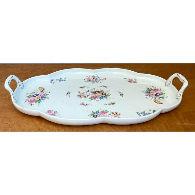 This exquisite vintage tray from the storied English porcelain house of Coalport is a masterclass in traditional British...