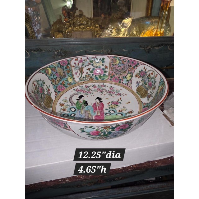 Stunning antique Japanese bowl made in the style of Chinese Famille Rose. This was completely broken in half at some point...