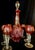 This elegant vintage small decanter set features the iconic ‘Traube’ pattern, characterized by rich cranberry colored...