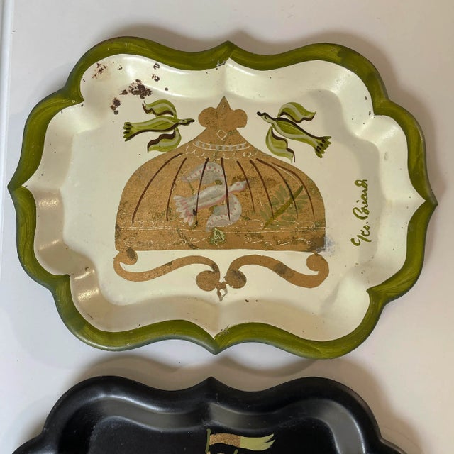Hand painted mid century detail at its best, this hand signed tray set is perfect for your cocktail table.