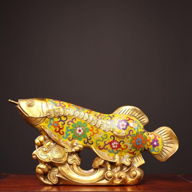 This is a substantial antique cloisonné enamel sculpture of a fish, a traditional Asian symbol representing abundance and...