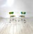 Pair of Broadway chairs, model 543. Chromed steel frame with epoxy resin seat and backrest. Spring-loaded feet with rubber...
