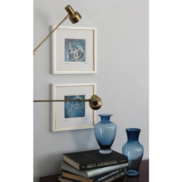 Titled, " Infinite Sky, V.I and V. II". Pair of exceptionally unique smaller abstracts framed in hand finished vintage...