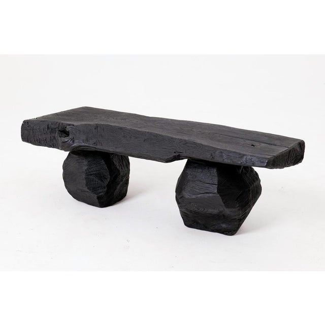This unique seating piece is a one of a kind functional sculpture, carved from a single piece of solid hardwood to ensure...