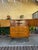 Beautiful MCM Walnut Vintage High Boy Dresser from American of Martinsville. Top front doors open to two drawers, atop...