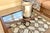 If quirk is what you crave, this might just be for you... This is a mercury glass candle holder with an antique iron...