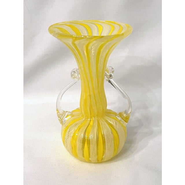 Gorgeous and cheerful Murano latticino vase in yellow and white. Two handles and trumpet neck