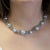 Cultured South Sea Pearls and Diamond Necklace in 18k white gold. Featuring a diamond encrusted box closure and cone...