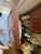 Late 20th Century Vintage Art Deco Style Painted Glass Panel Spice Rack Cabinet With 30 Bottles For Sale - Image 11 of 12