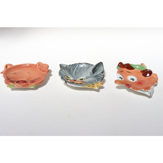 Charming set of three small plates for wall-mounting or vide poche/decorative dish use (ca. 1960s, Italy). Includes one...