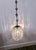 A stunning birdcage pendant light adorned with intricate details from the brand Eloquence. The cage is wrapped in stunning...