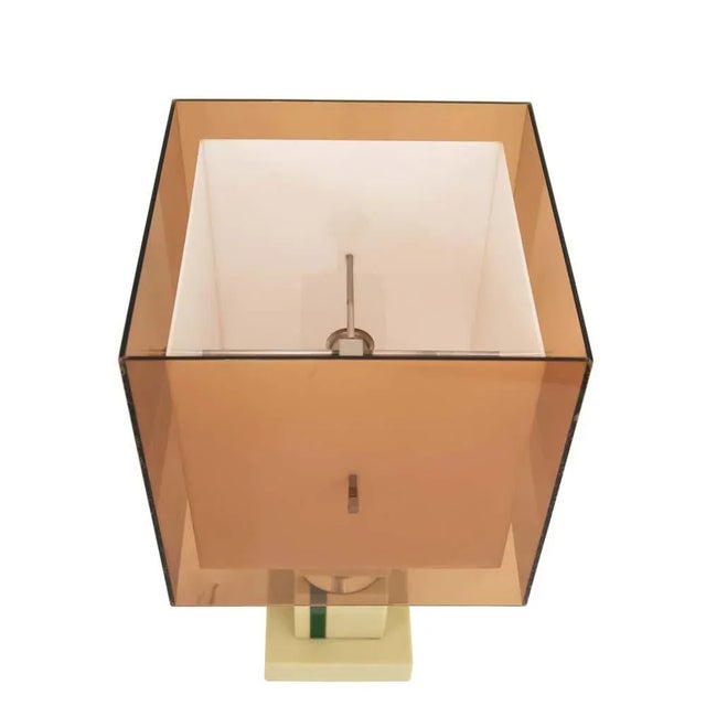 A single table light, original double acrylic glass shade on acrylic glass and chromed base by Pierre Giraudon. Up to 250V...