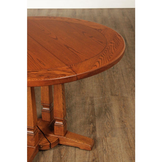 Romweber Round Viking Oak Expandable Dining Table With Four Leaves For Sale - Image 12 of 18