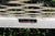 Vintage Lee L. Woodard & Sons Wrought Iron White Patio Set—A Table and Four Chairs For Sale - Image 18 of 18