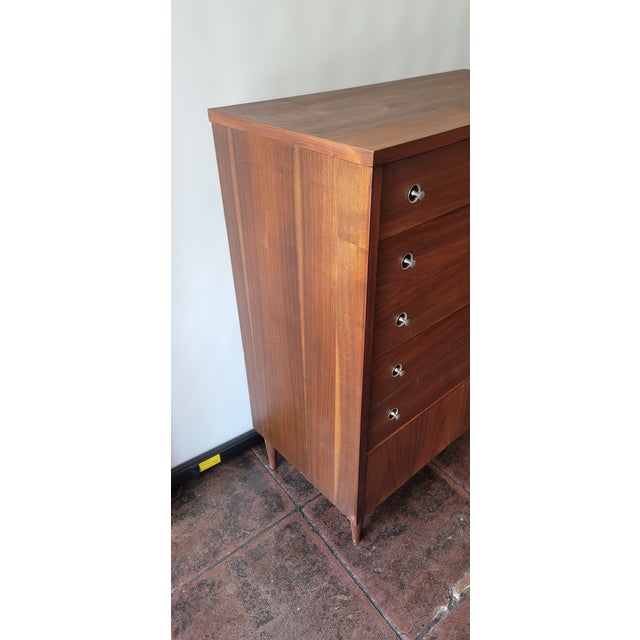 Mid Century Walnut Dresser tall boy. Has one small drawer than 3 large deep drawers. 4 Drawer total .Has Space Age 1950s...
