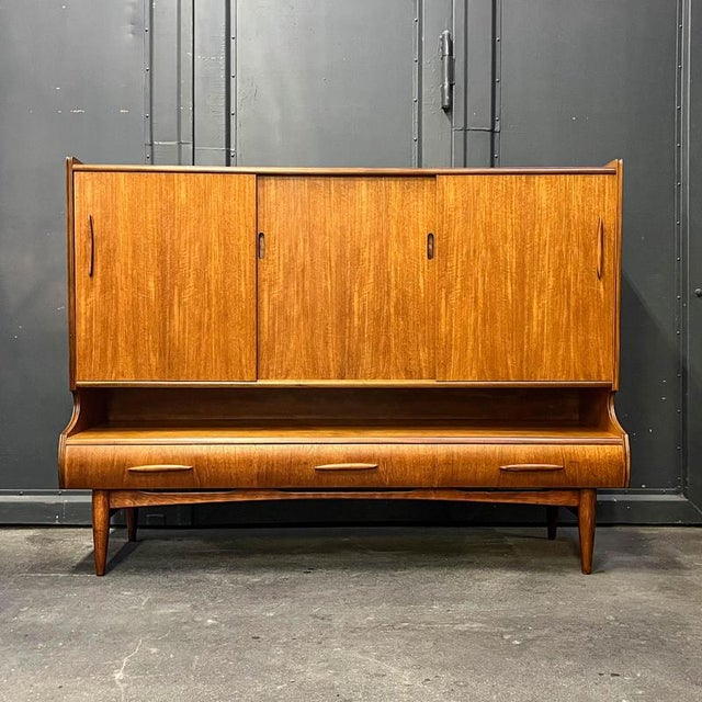 Product: sideboard / highboard style: mid-century · 1960s manufacturer: hisinges möbelaffär material: teak veneered body ·...