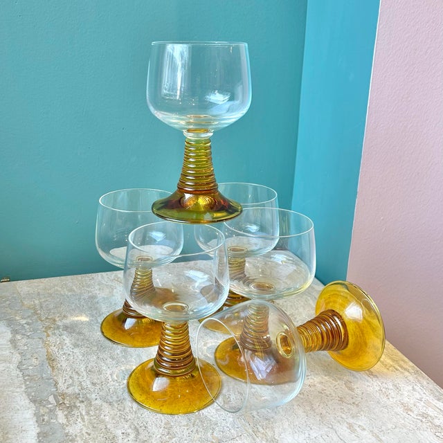 A gorgeous set of 6 German glass goblets, with ribbed amber colored stems, made by Roemer glass. Est circa 1970's....