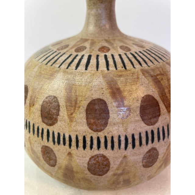 A vintage ceramic weedpot vase form vase with archaic or ancient styled decoration patterns reminiscent of Greek or even...