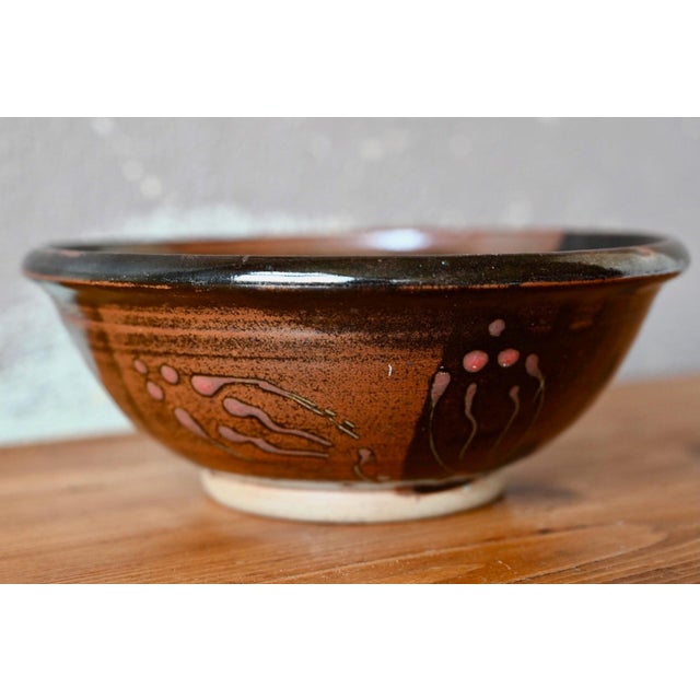 This lovely glazed stoneware bowl dates from the 1970s and is the work of a talented ceramist from Cluny. Its shape is...