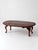 Vintage Queen Anne style drop leaf coffee table with elongated oval form, cabriole legs, and carved shell details at the...