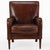 This pair of warm chocolate brown chairs is in very good condition and sits well with squared crests, slightly rolled arms...