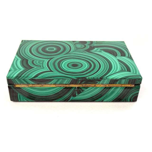 A stunning Malachite box out an estate collection of 4 rare specimen boxes. This box has beautifully graining and great...