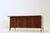 Gio Ponti (1891-1979) Desk in wood, brass, and enameled glass. Model made around 1950. Note: This model was made for the...