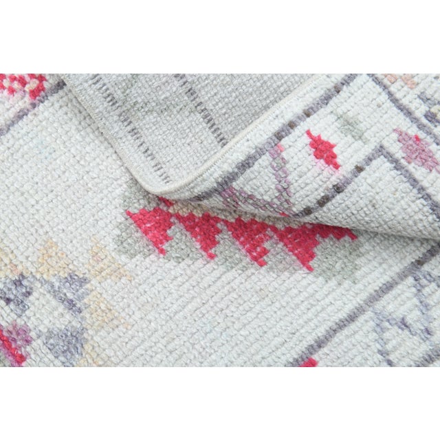 Textile Vintage Turkish Oushak White Runner with Colorful Motifs For Sale - Image 7 of 11