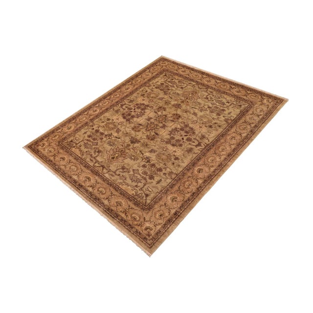 "Enhance the ambiance of your home with this magnificent Persian-influenced Turkish hand-knotted rug made by skilled...