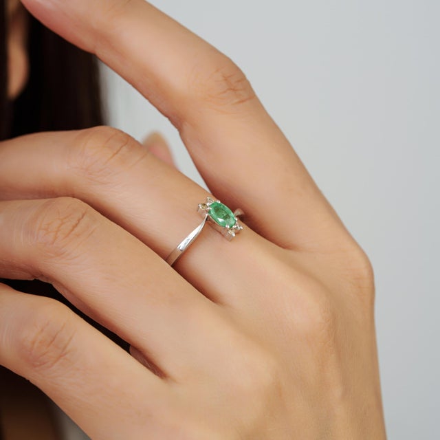 Mid Century Style 4 X 6 Mm Natural Oval Emerald Ring With Diamond Clusters Size 7 For Sale - Image 11 of 14