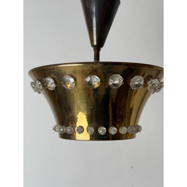 Elegant, simple and yet a jewel, a room decoration and a sign of timeless taste in design, this is what this rare ceiling...