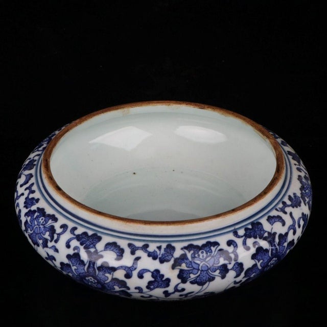 This elegant blue and white porcelain covered bowl, traditionally used as a tea cake container, is a beautiful example of...